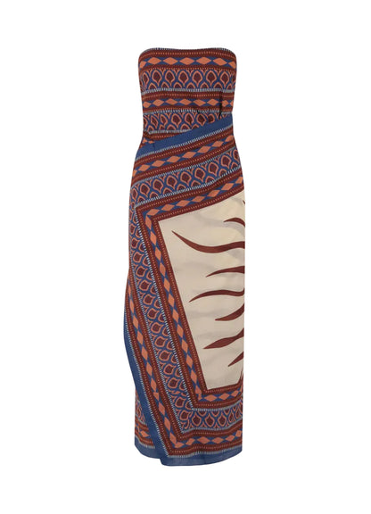 The Paraiso Agreste Ankle Dress by Johanna Ortiz features a bold blue, orange, and cream geometric wave pattern and a striking strapless neckline—perfect for summer soirées.