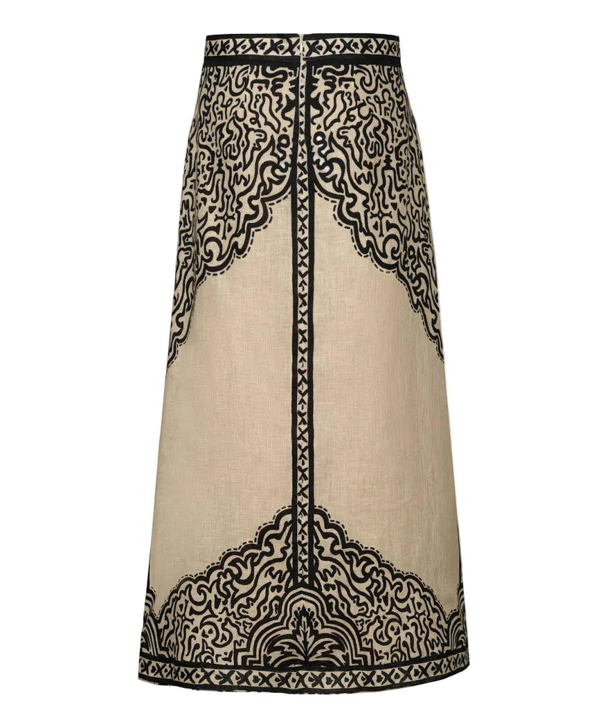 Johanna Ortiz Loose Horizon Ankle Skirt in tan, an A-line ankle-length linen design featuring a black geometric and floral border print.
