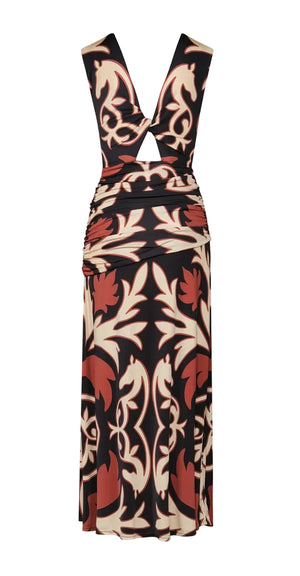 The Horizonte Mistico Midi Dress by Johanna Ortiz is a sleeveless, midi-length style with a front cutout and ruched waist, showcasing a striking brown, black, and cream abstract floral pattern inspired by the Equine Mola Tiles motif.