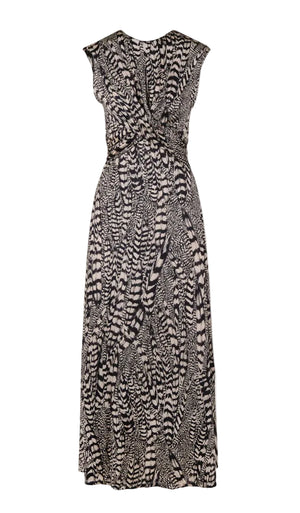 The Silent Rising Dress by Johanna Ortiz is a sleeveless, ankle-length piece showcasing a striking black and white External Feathers motif. It features a gathered twist detail at the waist and a gently flared hem, crafted from soft double-sided jersey for exceptional comfort and fluid drape.