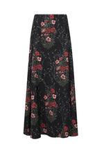 Black ankle-length Jacquard Encanto De Isla Ankle Skirt by Johanna Ortiz featuring a red and green botanical motif.