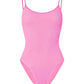 The Pamela Swim by Hunza G is a light pink one-piece swimsuit in Original Crinkle fabric, featuring thin spaghetti straps and a scoop neckline for adjustable coverage. Shown on a plain white background.