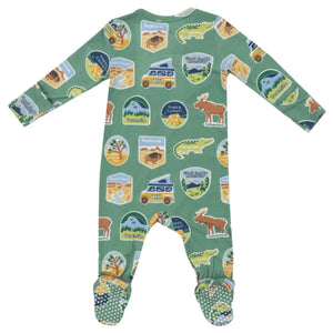 Introducing the Angel Dear National Park Stickers 2-Way Zip Footie: a green infant onesie designed with soft bamboo fiber fabric. It features nature-themed patches of animals and landscapes on the back, complete with convenient fold-over cuffs for extra warmth and comfort.