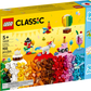 Image of the LEGO® Classic Creative Party Box (set 11029) from Legos - Toyhouse, containing 900 pieces. This imaginative building toy features colorful creations including a cake, clown, and unicorn, and is recommended for ages 5 and up.