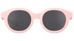 Front view of IZIPIZI #c Polarized Sunglasses with black polarized lenses and a light pink frame, providing UV protection. Displayed on a white background.