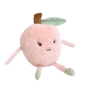 Introducing the MON AMI Peachie Peach, an adorable plush from Mon Ami designed to resemble a peach. This delightful stuffed animal features a smiling face, small arms and legs, and is topped with a charming green leaf and brown stem, making it an ideal playful companion.