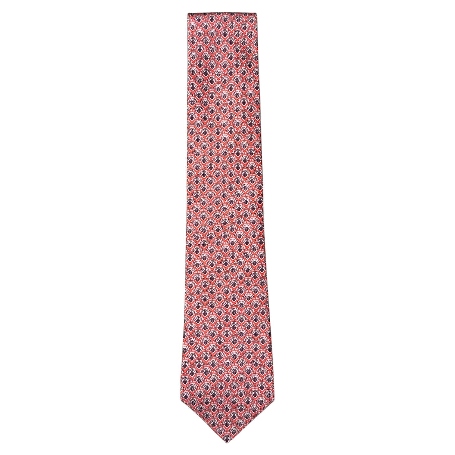 The Peacock Motif Tie by Robert Jensen features a peacock-inspired pattern in blue and white.