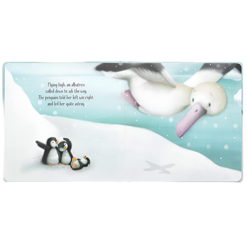 In the enchanting children's book "Jellycat The Naughty Penguins Book" by Jellycat, an albatross gracefully soars over a snowy landscape while three mischievous penguins scurry beneath. On the left page, playful text narrates the albatross's adventure in seeking directions, making it ideal for a cozy storytime.