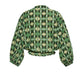Back view of the Perrin Top by Cara Cara—a long-sleeve blouse in green and cream with a geometric pattern, made from soft cotton voile and finished with elastic cuffs and hem.
