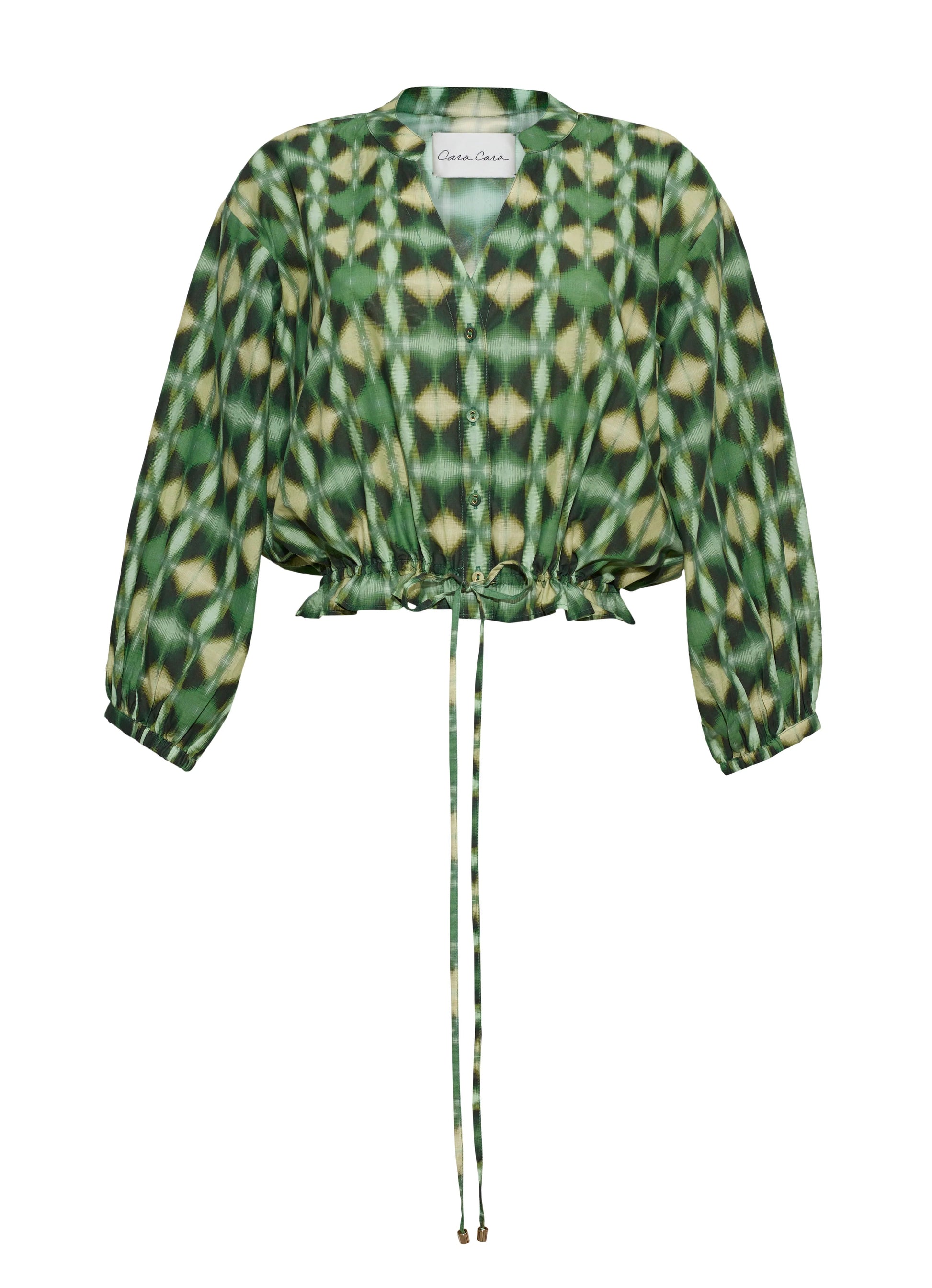 The Perrin Top by Cara Cara is a green, button-up blouse featuring a geometric pattern, long sleeves, and an adjustable drawstring waist. Crafted from breezy cotton voile fabric, it is displayed against a plain white background.