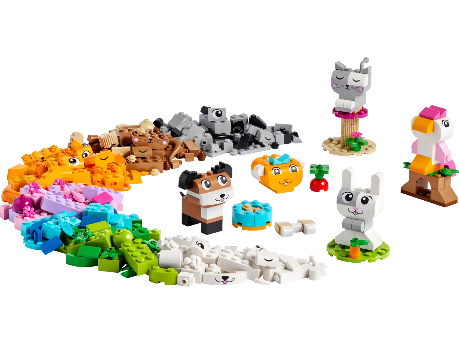 The LEGO® Classic Creative Pets set by Legos - Toyhouse features a vibrant collection, including a cat, bunny, owl, and parrot. This set comes with an assortment of building blocks arranged around them to spark imaginative free-building ideas.