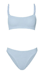 The Hunza G Phoebe Bikini features light blue crinkle fabric, a square neck top with braided straps, and matching high-cut bottoms, shown against a white background.