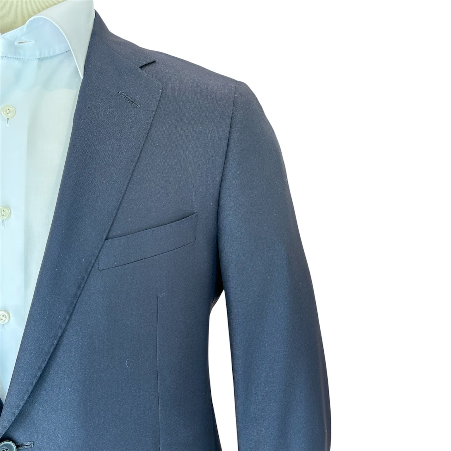 A close-up of a person wearing a navy Samuelsohn Bennet Contemporary Fit Suit jacket over a white dress shirt, shown from the chest up against a white background.