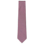 The Maltese Cross Tie by Robert Jensen is hand-stitched in Italy from red silk, featuring a repeating pattern of small white and blue circular shapes.
