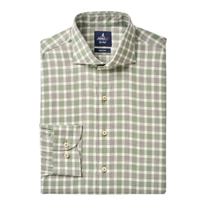 The Peirce Buttondown by Johnnie-O is a folded long-sleeve premium cotton shirt with a green and white plaid pattern, cutaway collar, front pocket, and cream-colored buttons.