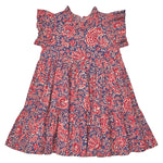 The Girls’ Jennifer Dress by Pink Chicken features short sleeves, ruffled details, and a tiered skirt, adorned with a red and white paisley vines pattern on a blue background—making it the perfect charming fall dress.