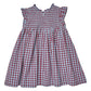 Pink Chicken Girls’ Stevie Dress in red and white plaid, featuring a smocked bodice, ruffled cap sleeves, and a flared skirt, displayed on a plain white background.
