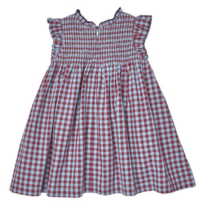 Pink Chicken Girls’ Stevie Dress in red and white plaid, featuring a smocked bodice, ruffled cap sleeves, and a flared skirt, displayed on a plain white background.