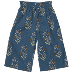 Girls’ Theodore Pant by Pink Chicken with paperbag elastic waist, front drawstring, and floral print in brown, white, purple, and green.