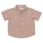 The Pink Chicken Boys' Jack Shirt in Cocoa Gingham features short sleeves, a collar, brown and white checkered pattern, and a blue heart logo on the lower right side.