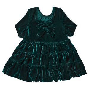Girls’ Pearl Dress in evergreen velour with short sleeves, a neckline bow, and a tiered, ruffled skirt.