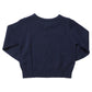 Back view of a navy blue Boys’ Oliver Sweater with long sleeves, ribbed cuffs, and a ribbed hem.