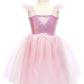 The Great Pretenders Sequins Princess Dress by Great Pretenders is an ideal choice for special occasions. This glamorous pink children's dress features a glittery bodice, spaghetti straps, ruffled shoulders, and a tulle skirt, all beautifully displayed on a dress form to ensure your little one sparkles with elegance.