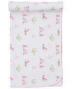 The Kissy Kissy Fairway Foursome Printed Blanket is a charming Pima cotton baby blanket with a delightful pink and green golf-themed print featuring golfers, clubs, and golf carts. It is elegantly finished with scalloped pink stitching along the edges.