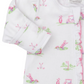 Kissy Kissy Fairway Foursome Printed Zip Footie: A white baby outfit with cozy footies, adorned in pink and green golf-themed prints featuring clubs, carts, and flags, made from soft Pima cotton.