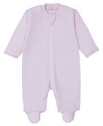 The Kissy Kissy Crescent Moonlight Printed Zip Footie for baby girls is made from pink Pima cotton, featuring long sleeves, cozy foot coverings, and adorned with a subtle crescent moonlight and star pattern.