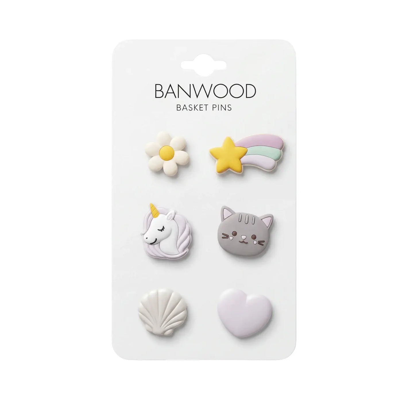 A card labeled “Kids’ Bike Basket Pins” by Banwood displays six collectible pins—a daisy, shooting star, unicorn, cat face, seashell, and heart—arranged in two columns on a white background. Perfect for decorating Pin & Ride Baskets or personalizing your collection.