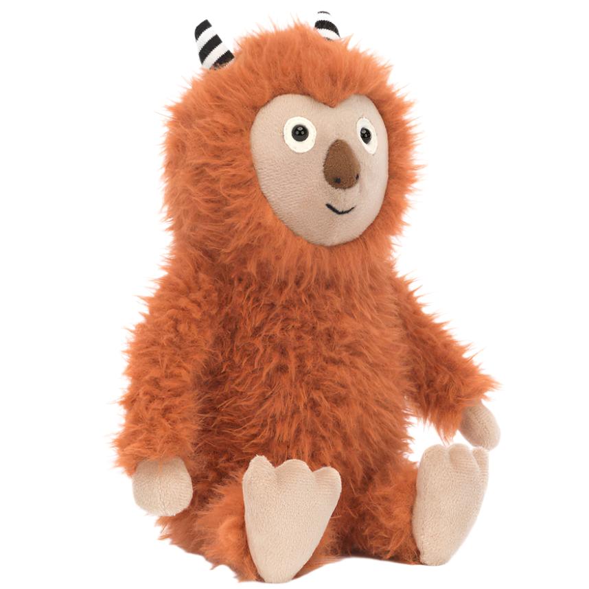 Introducing the Jellycat Pip Monster by Jellycat: a fluffy orange stuffed animal with gingery fur, round eyes, small black-and-white striped horns, and a charming suedey truffle nose.