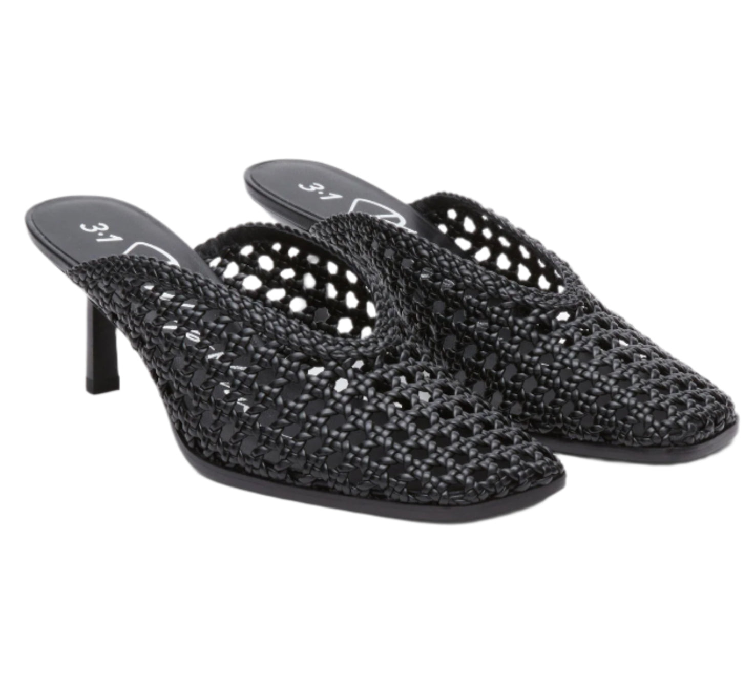 The ID Macrame Mule by 3.1 Phillip Lim features black handwoven faux leather, open backs, pointed toes, mid-height heels, and an architectural perforated pattern for a modern heeled mule look.