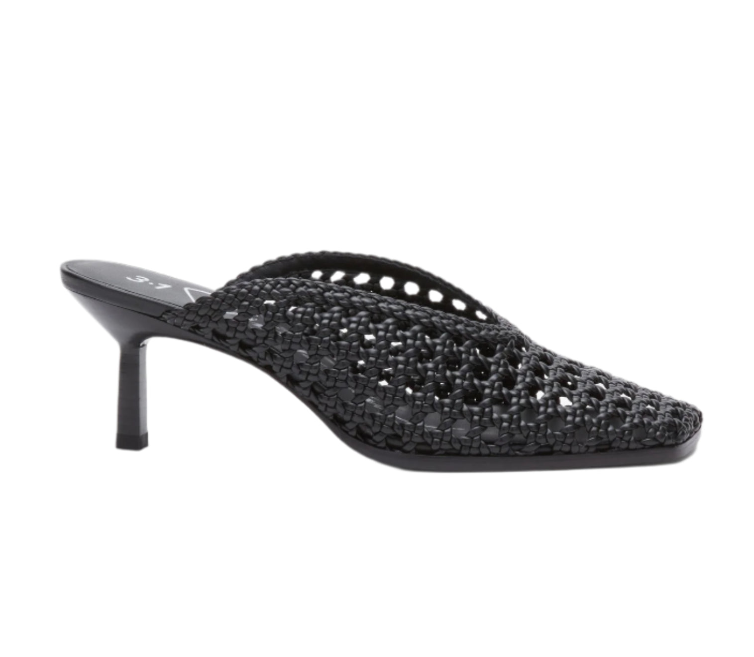 The 3.1 Phillip Lim ID Macrame Mule features a pointed toe, mid stiletto heel, handwoven faux leather, and an open-back architectural design.
