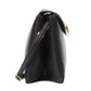 Side view of the ID Soft Dual Clutch by 3.1 Phillip Lim, made from Verona leather, with a thin strap, gold buckle detail, and a removable shoulder strap for versatility.
