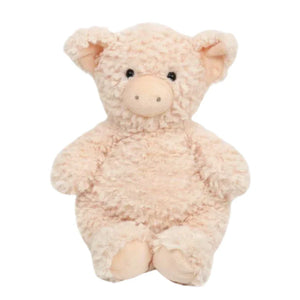 The Mon Ami "Polly Pig" plush is a soft, light pink toy with curly fur, round black eyes, a snout with two nostrils, and floppy ears—perfect as a gentle newborn plush.