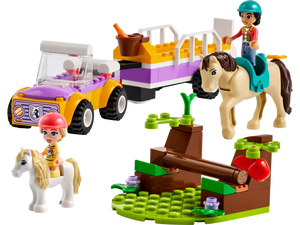 Lego set displaying two figures riding horses along with a purple and yellow vehicle. The small green playset includes a tree, stream, and comes with the LEGO® Friends Horse and Pony Trailer by Legos - Toyhouse for your riding trip adventure.