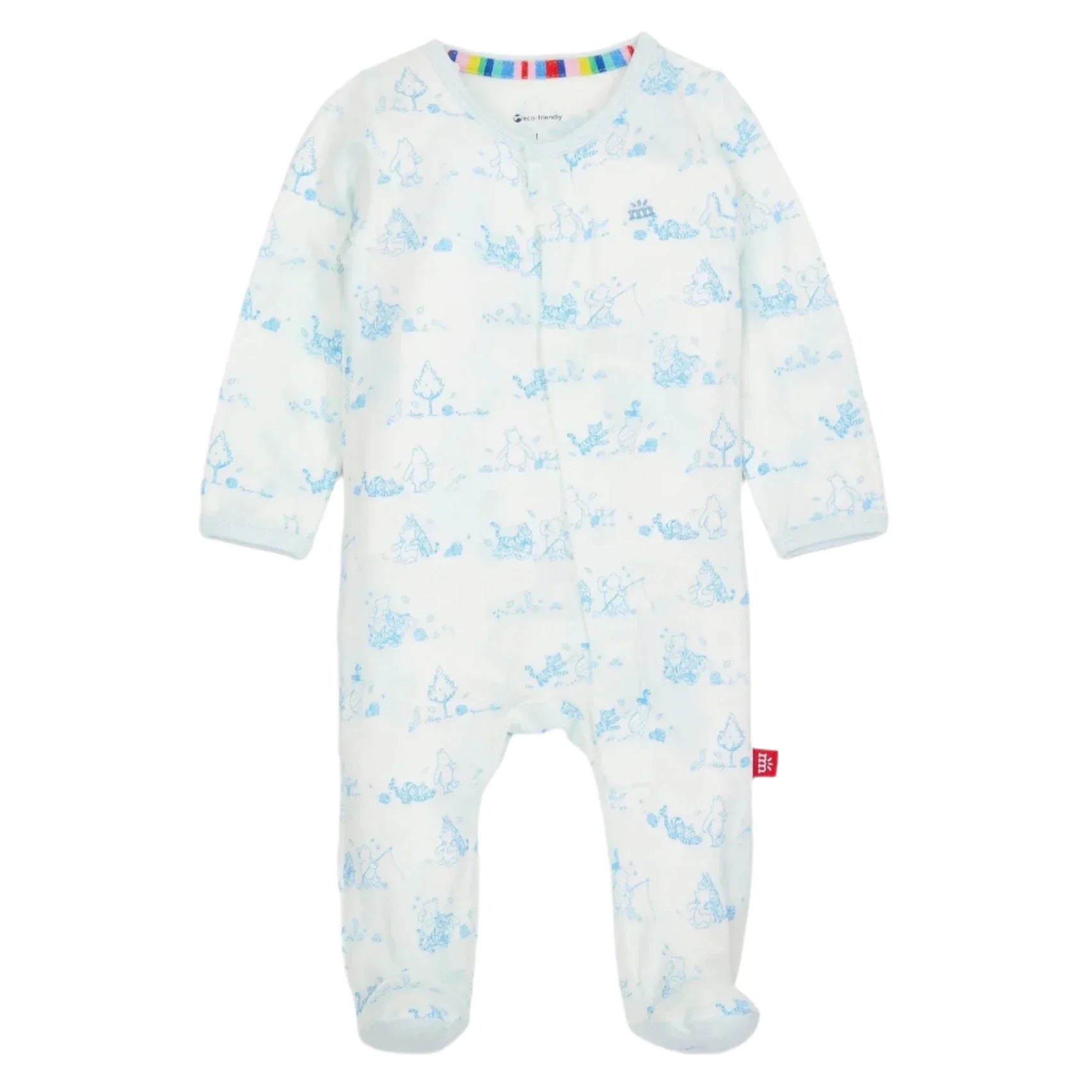 The Magnetic Me Pooh in the Woods Footie is a white baby onesie adorned with blue animal patterns. It features long sleeves, enclosed feet, and a convenient front zipper, accented by a small red tag on the side. Designed for easy dressing, this footie is crafted from eco-friendly TENCEL™ modal to ensure added comfort.