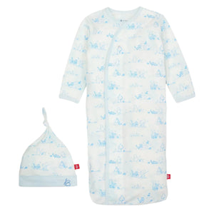 Magnetic Me's Pooh in the Woods Gown and Hat for newborns to 3 months features an eco-friendly TENCEL™ modal fabric with magnets for easy changes and showcases a charming light blue animal print on a white background.