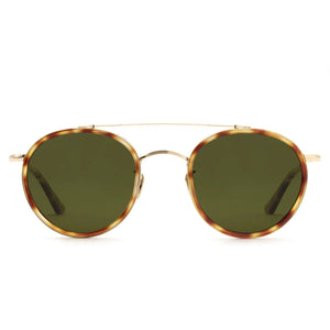 Krewe Porter Polarized Sunglasses with green lenses feature a gold metal frame, tortoiseshell rim detailing, and a classic round design, shown front-facing on a white background.