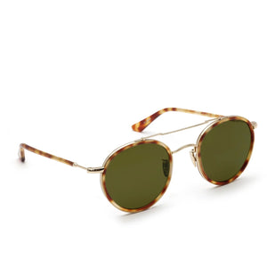 Krewe Porter Polarized Sunglasses feature round tortoiseshell acetate rims, green lenses, and gold metal arms and bridge, shown on a white background.