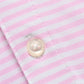 Close-up of the Johnnie-O Stetsons Polo, a pink and white striped lightweight fabric with two white buttons.