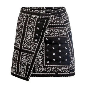 The Powell Skirt by Hunter Bell NYC is a black and white wrap silhouette with a patchwork bandana print and front square pocket—an effortless statement piece for your wardrobe.