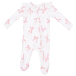 The Angel Dear Baby Girls’ 2-Way Ruffle Sleeve Zipper Footie features long sleeves, ruffle shoulders, and a pink bow pattern with a diagonal zipper closure. It is crafted from soft ribbed modal fabric for added comfort.