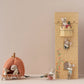 Various toy mice interact with the Maileg Pumpkin Carriage, Mouse, and a block tower, creating a playful scene reminiscent of a fairytale. This enchanting royal mouse carriage from Maileg makes it an ideal toy for kids.