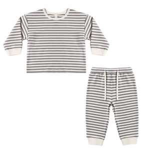 The Quincy Mae Baby and Kids’ Cozy Set is a two-piece children’s pajama set with gray and white horizontal stripes, featuring a long sleeve top and drawstring pants with an elastic waistband for comfort.