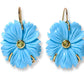 The New Bloom Earrings by Lizzie Fortunato feature gold-plated brass, blue mother-of-pearl flower blooms with green gemstone centers, and gold hooks.