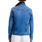 Rear view of a person wearing the Proenza Schouler Newman Jacket, a stylish blue denim jacket crafted from organic cotton, layered over a white shirt.