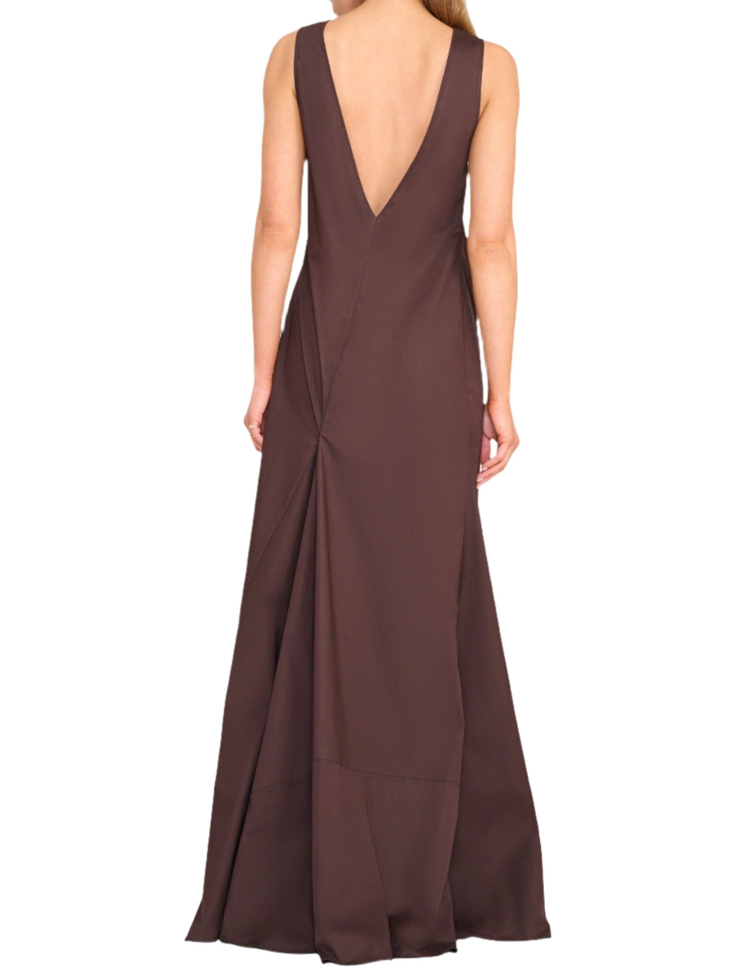 A person stands wearing a sleeveless, deep V-neck, full-length brown dress, viewed from the back against a plain white background. This Staud Roma Dress by Staud transitions effortlessly as a classic day to night dress.