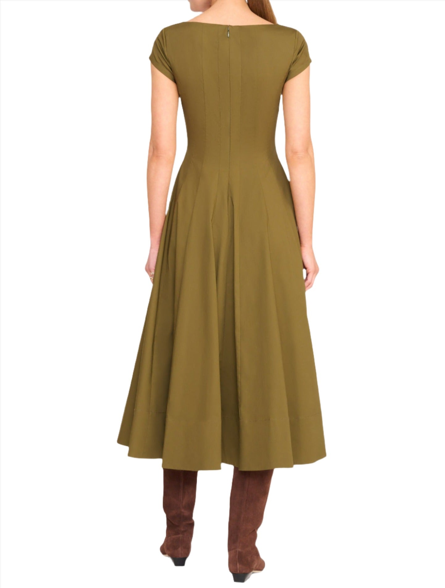 A person is shown from the back wearing an olive green, short-sleeved Staud Wells SS Dress with a flared a-line skirt, paired with brown heeled boots.